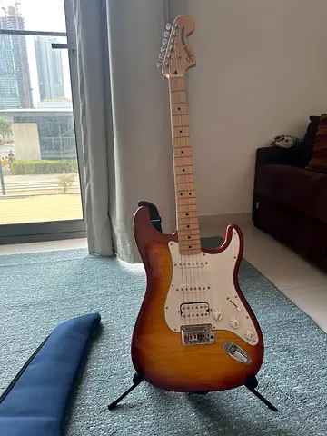 Electric guitar - Squier Stratocaster by Fender