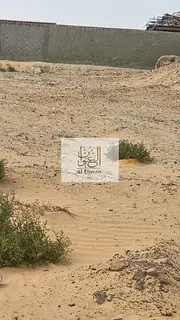 A plot of land for sale in Al-Hawshi
