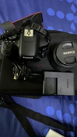Canon DSLR kit with extra lens, charger and bag - good working condition