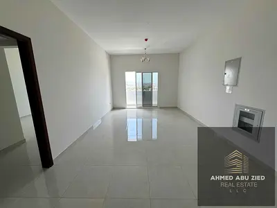 Spacious 1BHK with open sea view for annual rent in Ajman Corniche Al Rumaila 1 master room 2 bathrooms central AC free parking 40k yearly