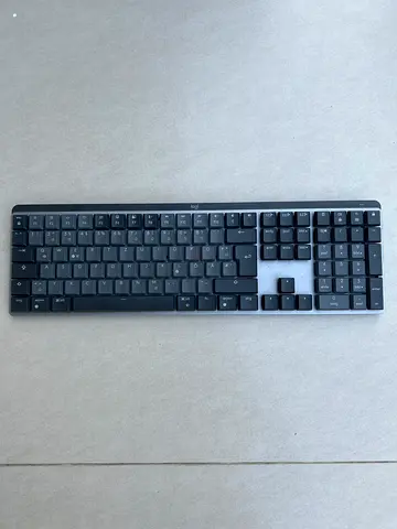 Slim full-size wireless keyboard with numpad — lightly used