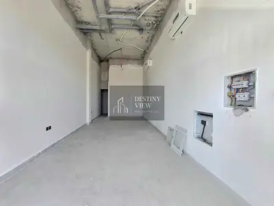 Title: 850 Sqft Commercial Shop for Rent in Hoshi | Prime Main Road Location | AED 65,000/year