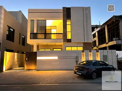 Direct from the owner, including all ownership fees: a villa in one of Ajman's most luxurious villas, built and finished to a super deluxe standard, w
