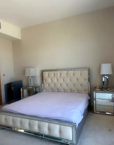 Queen tufted mirrored bed frame with matching bedside tables - good condition