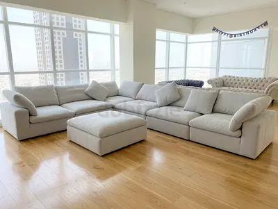 Pan Emirates pianca feather filled sofa with footstool