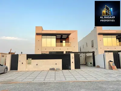 Luxury villa with a modern design, 5000 sq ft, with a garden, behind Ajman Academy. Price includes air conditioning and is negotiable.