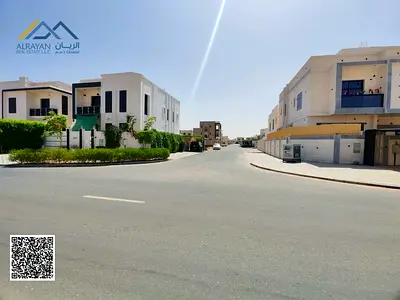 Prime investment land in Al Yasmeen Garden Ajman on paved roads 100% freehold for all nationalities including registration fees