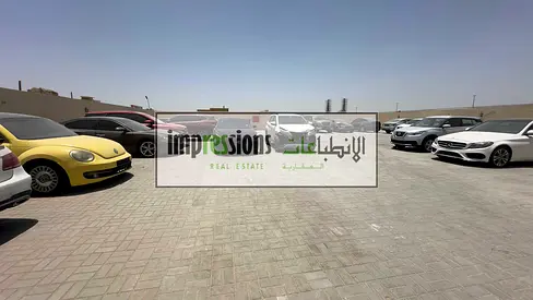 YARD FOR RENT IN AL SAJJA, SHARJAH | ROAD FACING | FULLY INTERLOCKED | NEAR CAR MARKET