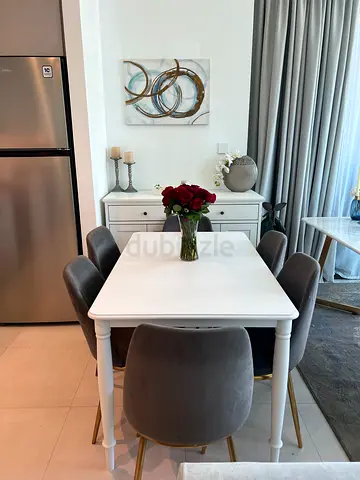 White Wooden Dining Table with 6 Grey Velvet Chairs - Compact Set