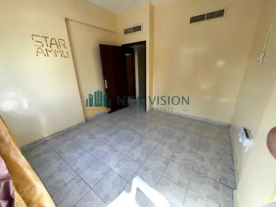 One bedroom apartment in Al Majarah with spacious layout central AC family tower free municipality attestation no extra fees annual rent 21880 AED.