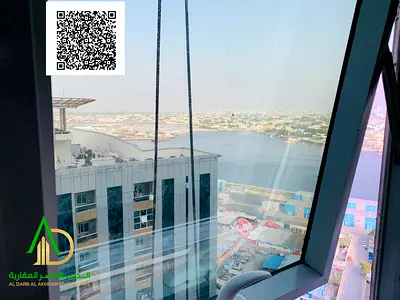 for sale in Al Bustan, Ajman – in Orient Towers, in a strategic location near Mina Street, the Free Zone, and the Fish Market. Fully finished, very cl