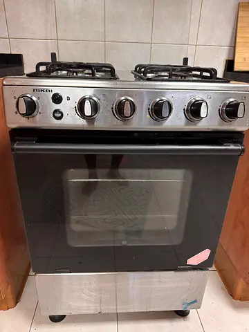 Cooking gas oven - with 4 burners ( large oven — perfect  condition ) used by vegeterian