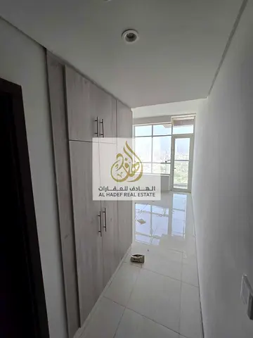 شقة غرفتين وصالة مع إطلالة مفتوحة وباركنج | شارع الشيخ خليفة | الراشدية 3