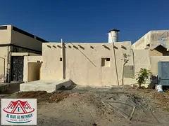 A clean three-room house on a main road in Al-Sabkha