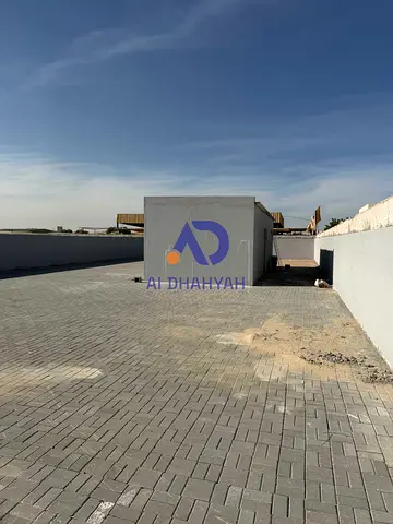 Land for sale in Al Sajaa – Al Jalil. Area 5,166 sq.ft, on paved road. Electricity fees paid and ready. Great location, ideal for investment
