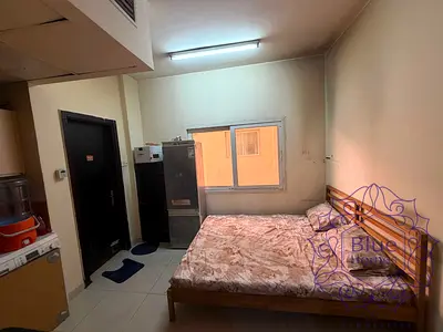 Semi furnished studio for monthly rent 1500aed