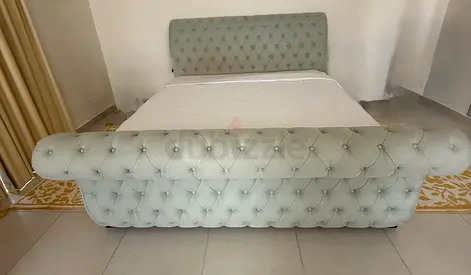 Light grey tufted upholstered super king bed with headboard and footboard- free designer mattress
