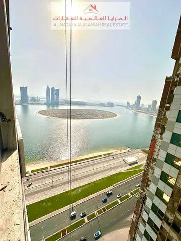 Monthly - Two rooms and a hall - Al Taawun -BEACH TOWER 2- Deluxe furniture - With internet -3 bath