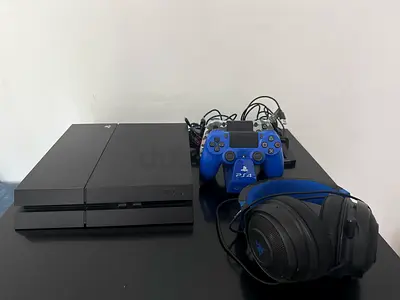 Sony PlayStation 4 Console with Controllers and Razer Headset and cables