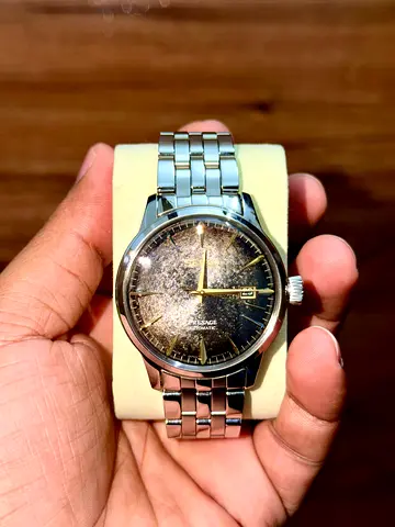 Mens stainless steel automatic watch with black dial — gently