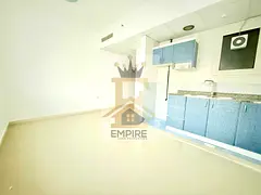 Bright spacious studio in very Prime location open view free gym and pool very Easy Exit to Dubai