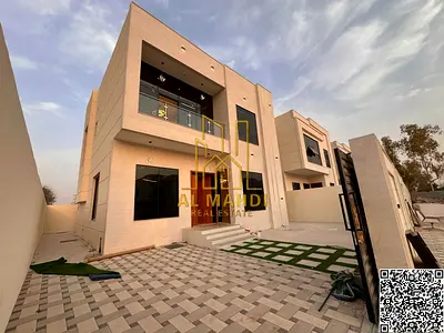 السعر شامل رسوم التسجيل والتمليك  موقع ممتاز تمليك حر  فيلا للبيع في عجمان  تصميم عصري بواجهة حجرية وتشطيبات شخصية فاخرة للغاية، مع مساحة إضافية،.