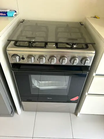 Stainless Steel 4-Burner Gas Cooker with Oven - Good Condition