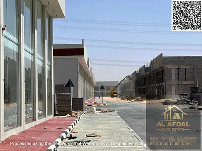 عرض استثماري قوي ! مبنى تجاري جاهز في موقع مميز على الشارع شامل جميع الرسوم