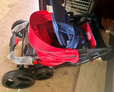 Foldable red baby stroller/pram - excellent condition