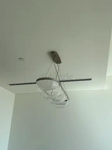 Modern ceiling light fixture with three glass shades