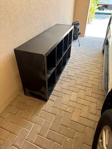 Black low storage cabinet with 8 cubbies — good condition 2 units
