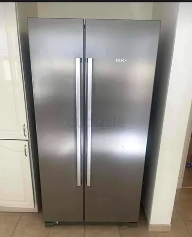 Bosch side by side refrigerator neat and clean , same like anew condition ,perfect working