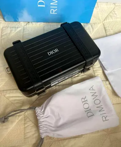 DIOR and Rimowa personal clutch