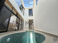 Two-story corner villa with a private pool and rooftop terrace. Spacious, palatial design with luxur