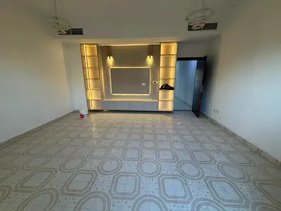 **4BR townhouse Uptown Al Zahia Ajman 3 floors 5 bath 2 balconies open view living laundry storage modern kitchen built-in wardrobes central AC**