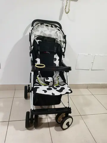 Lightweight rocker and Baby Stroller in Black  White – Good Condition