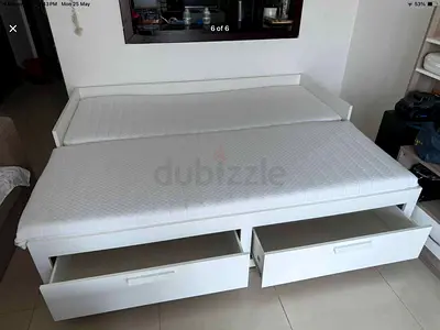 l brimness  Day bed with 2 storage drawers underneath and with 2 IKEA mattresses is available