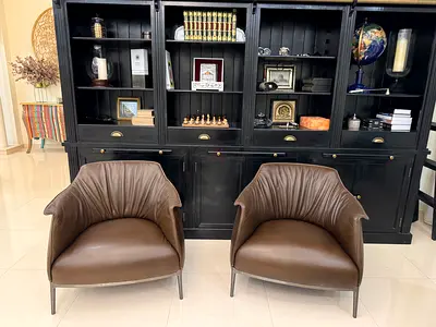 x2 POLTRONA FRAU Archibald Leather Armchairs in dark brown leather with chrome plated metal base