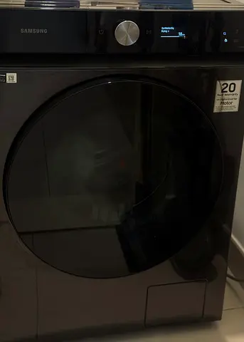 Samsung Washer + Dryer Combo — WD11BB944DGB