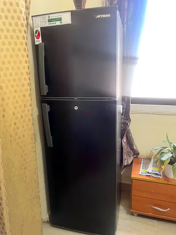 Black Double-Door Refrigerator - Good Working Condition