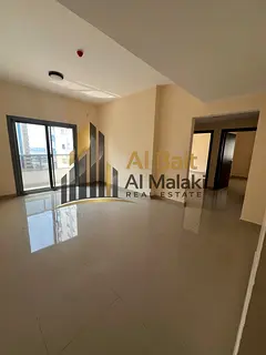 Annual Apartment for Rent in Al Majaz 3 Spacious 2-Bedroom Apartment with a Living Room and Balcony,