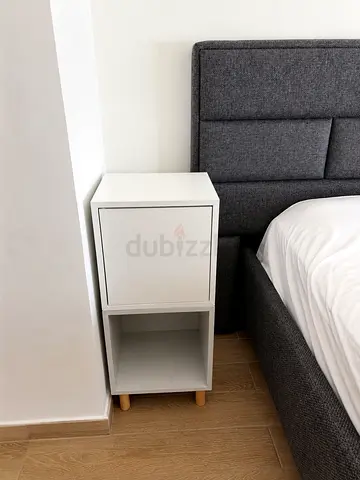 Ikea bed table with a door