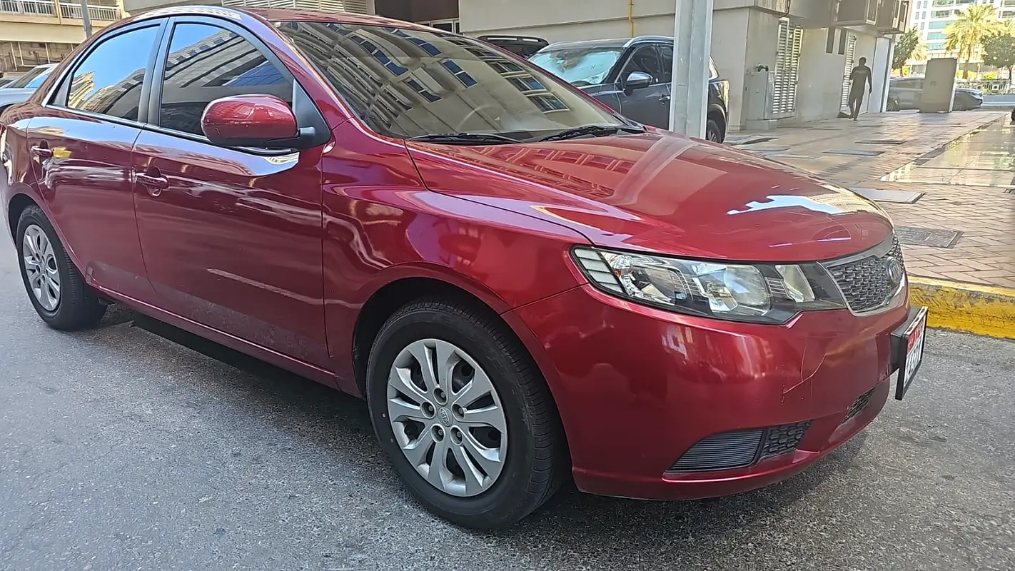 Kia Cerato 2011 — photo 1 of 11