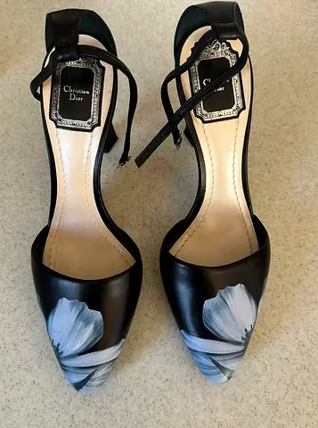 Dior floral-print wedge pumps heels and ankle strap with buckle detailing.