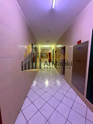 Al Bait Al Malaki Real Estate Annual Apartment for Rent in Al Majaz 2 A well-designed one-bedroom apartment with a living room, offering a practical l