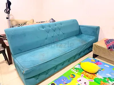 Blue Upholstered 7 seated sofa