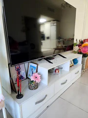 TV stand premium wood home center with multi orientation. Adjustable parts. Quality product