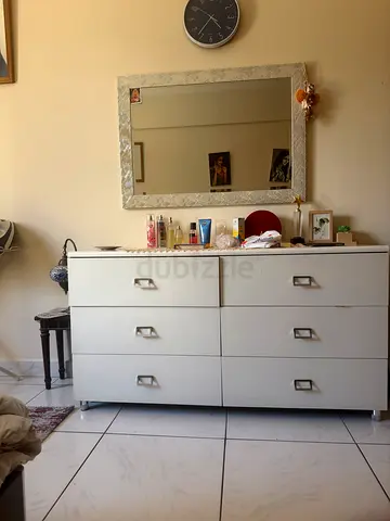 White 6-Drawer Dresser with Mirror - 700 aed, pick up from mankhool