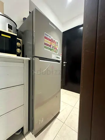 2-Door Refrigerator - Silver, Good Working Condition. still have warrenty like new