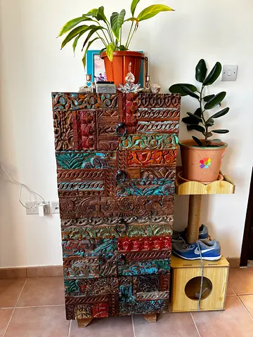 Hand-carved Wooden Chest of Drawers with Colorful Patina - Unique Decorative Storage.
